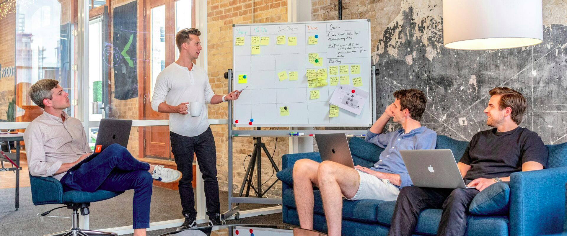 Work & Learn cohort gathered around a daily standup
